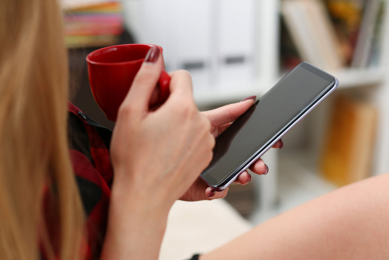 woman-holding-samsung-galaxy-phone