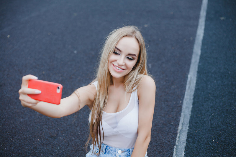 woman-holding-apple-iphone-8-plus